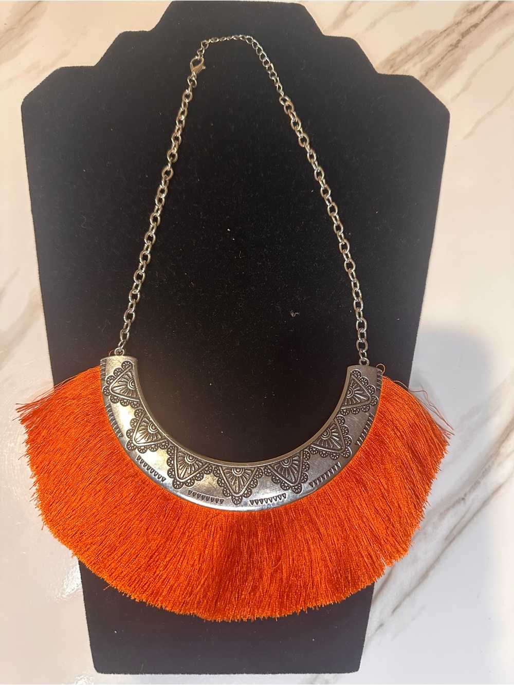 Handcrafted Orange Fringe Necklace with Antiqued Silver Accent